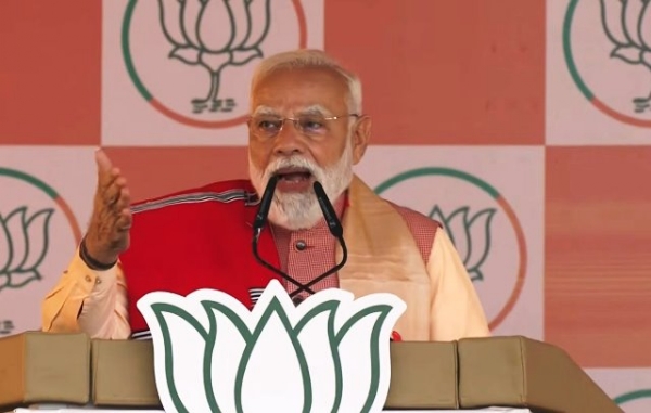 ਪ੍ਰਧਾਨ ਮੰਤਰੀ ਨਰਿੰਦਰ ਮੋਦੀ ਬੁੱਧਵਾਰ ਨੂੰ ਅਸਾਮ ਵਿੱਚ ਚੋਣ ਰੈਲੀ ਨੂੰ ਸੰਬੋਧਨ ਕਰਦੇ ਹੋਏ।