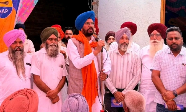 ਸੰਬੋਧਨ ਕਰਦੇ ਕੁਲਦੀਪ ਸਿੰਘ ਧਾਲੀਵਾਲ