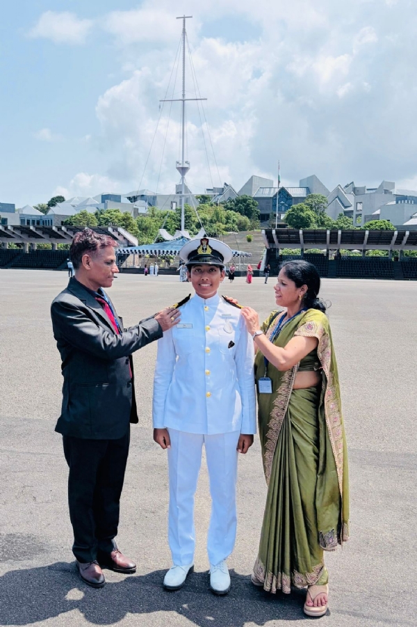 Nisha with parents. Nisha with parents.