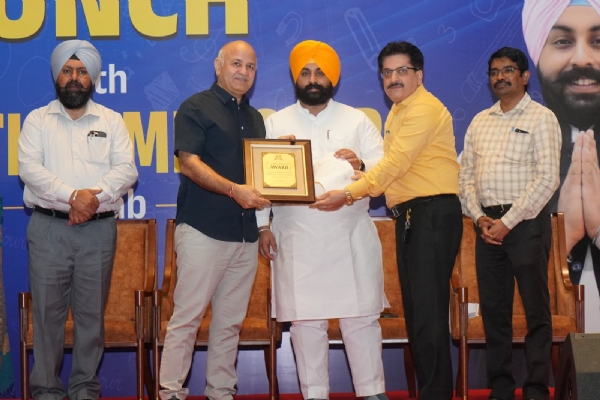 Minister Harjot Singh Bains and AAP Punjab in-charge Manish Sisodia felicitating principal Minister Harjot Singh Bains and AAP Punjab in-charge Manish Sisodia felicitating principal