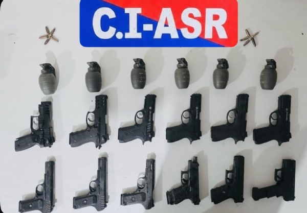 Recovered Hand Grenades and Pistols Recovered Hand Grenades and Pistols